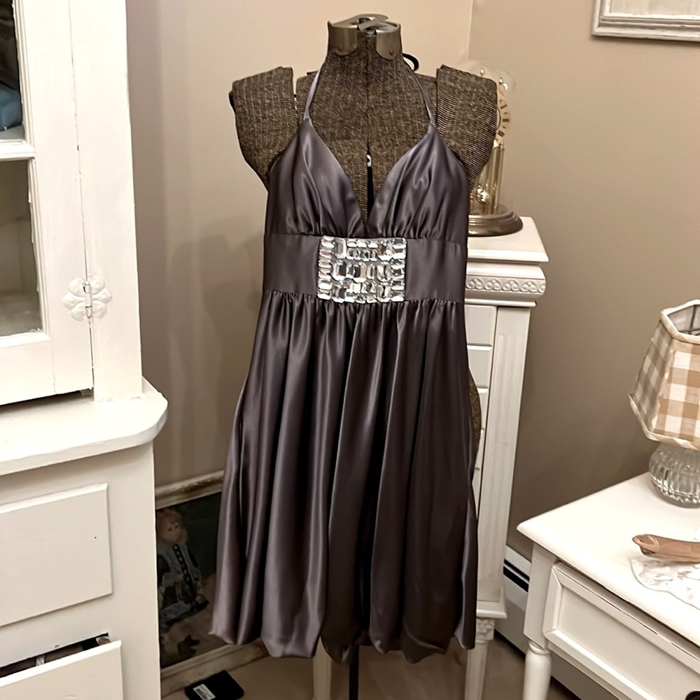 Like new (worn once), short, halter dress from Caché. Size 2. Polyester/spandex.